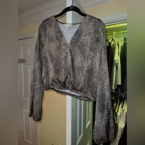 Patterned blouse slightly cropped. South moon under size M